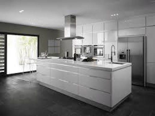 Contemporary kitchen renovation featuring white high-gloss cabinets, stainless steel appliances
